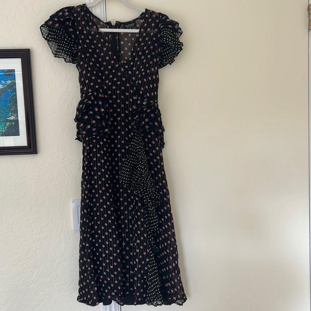 Top shop black and floral dress. Worn twice! Very good condition.